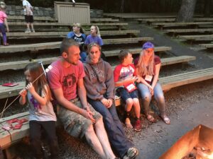 family around a campfire